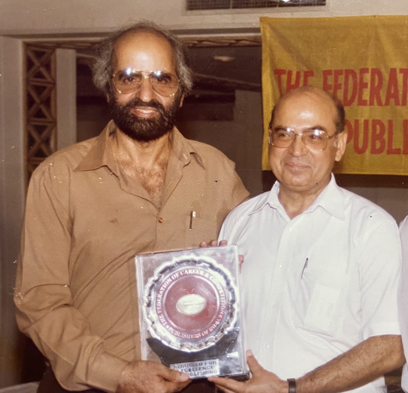 Prof. Dhillon receiving the FEPI Award for Excellence in Publishing